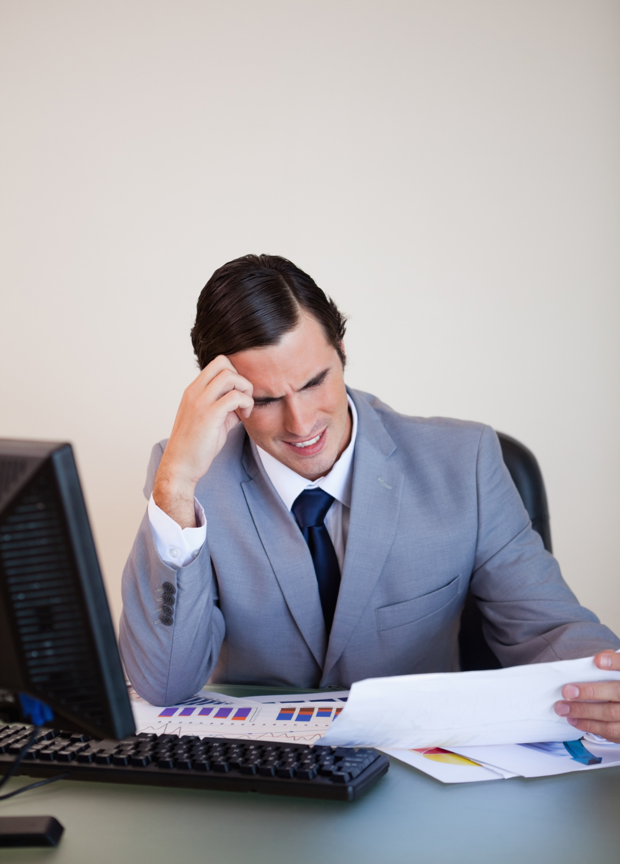 Business owner reviewing statements